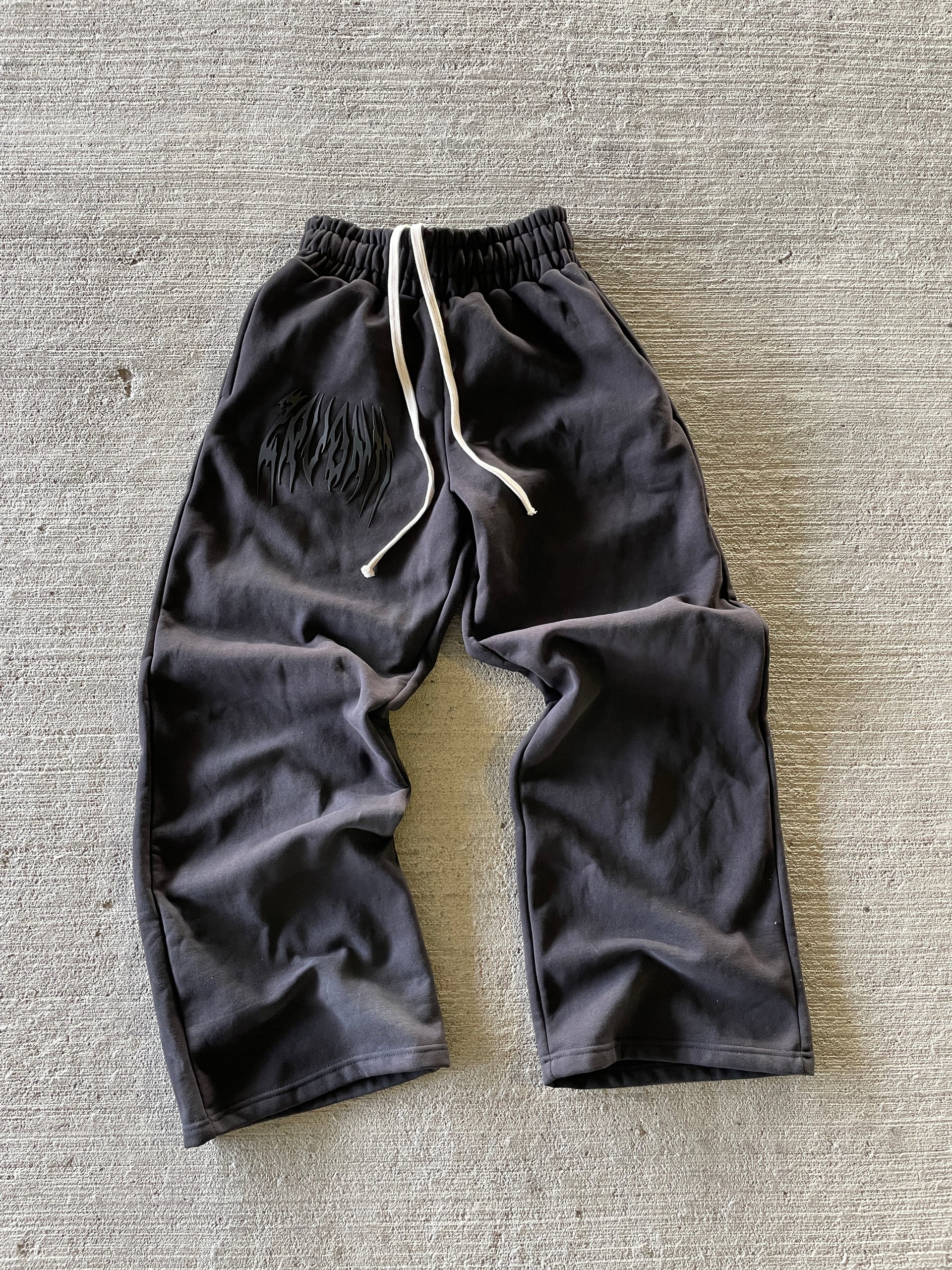 BLACK JAGGED WIDE LEG SWEATS